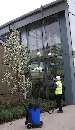 Vacuum cleaning gutters for commercial customers in Weybridge